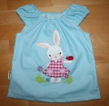 Schöne Bluse Gr. 116 mit einer süßen Hasenmädchen Doodle Stickerei